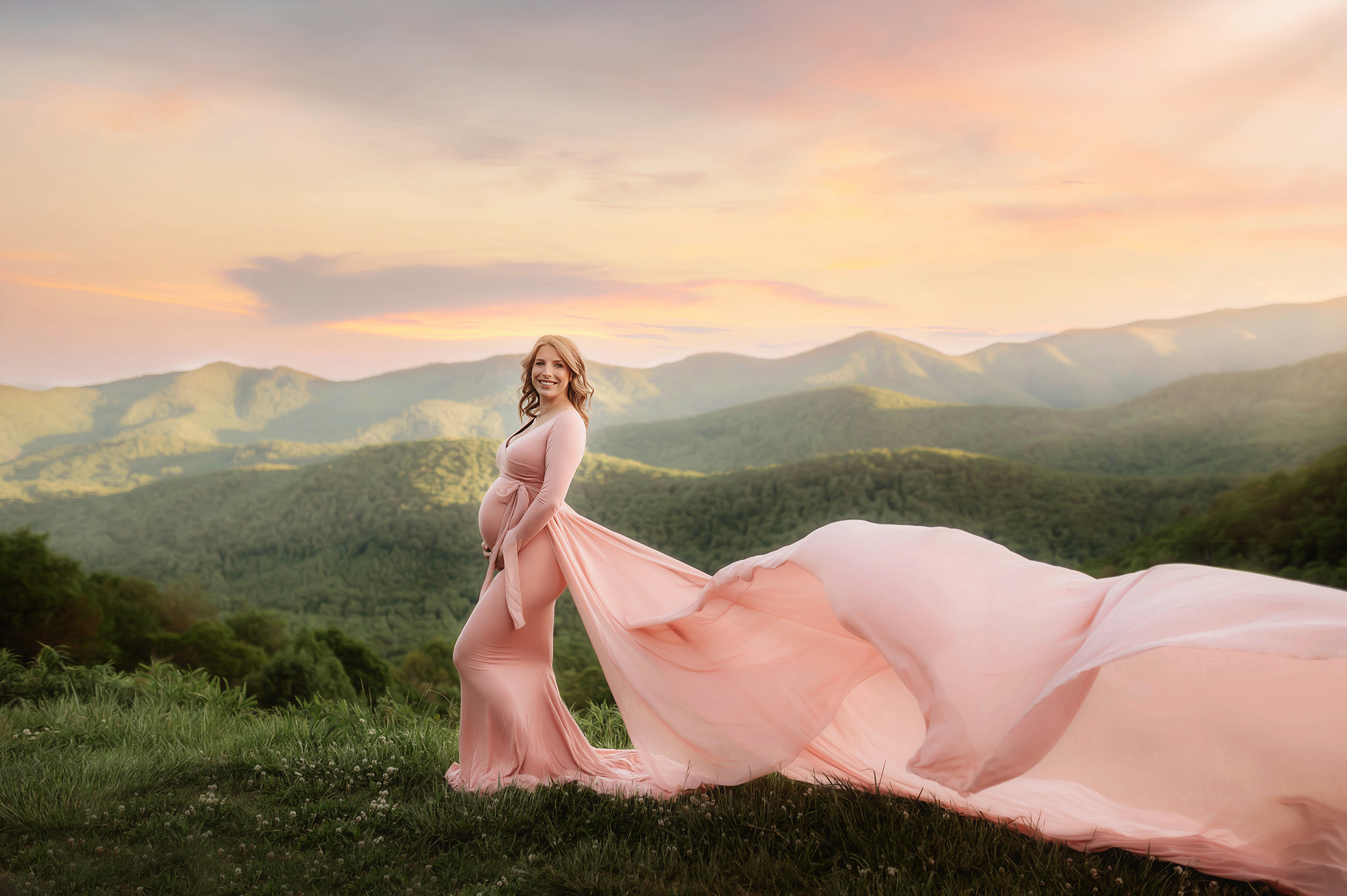 Expectant mother poses for Maternity Photos on the Blue Ridge Parkway in Asheville, NC.