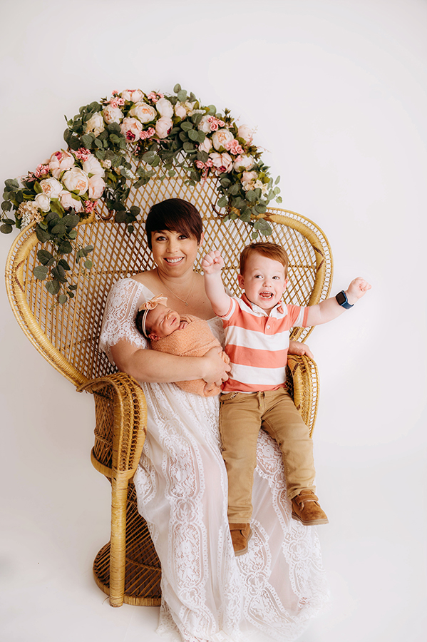 Mother poses with her babies for Mother's Day Mini Sessions at Asheville, NC Family Photography Studio.
