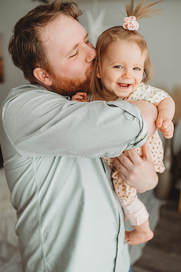 Father poses with his daughter for Father's Day Mini Session at Asheville, NC Family Photography Studio.