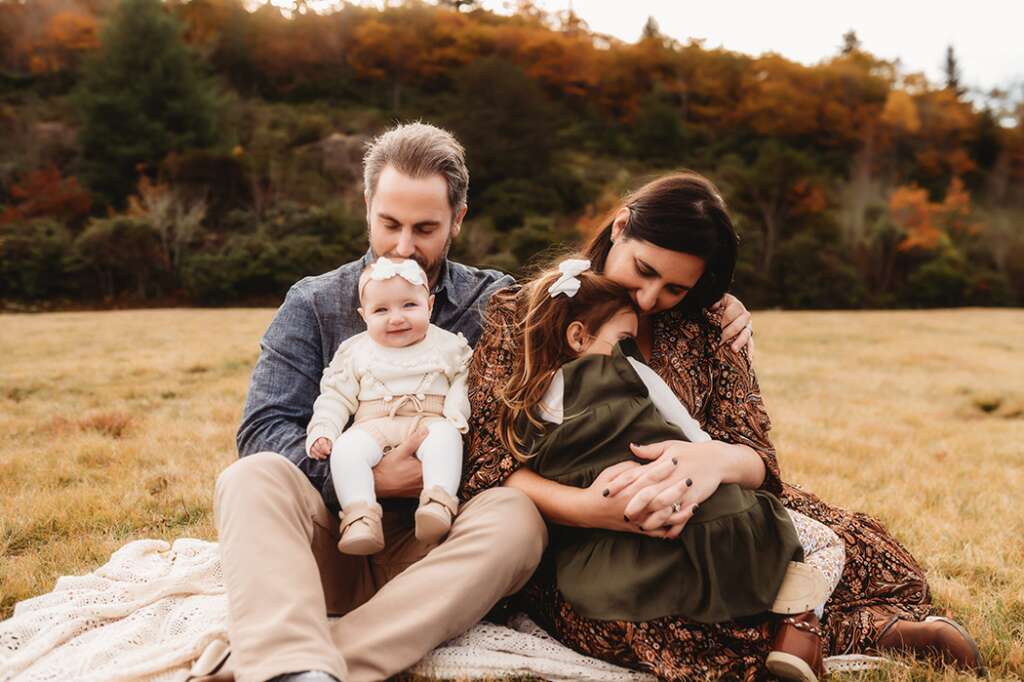 Family poses for Portraits during Family Photo Session on the Blue Ridge Parkway in Asheville, NC.