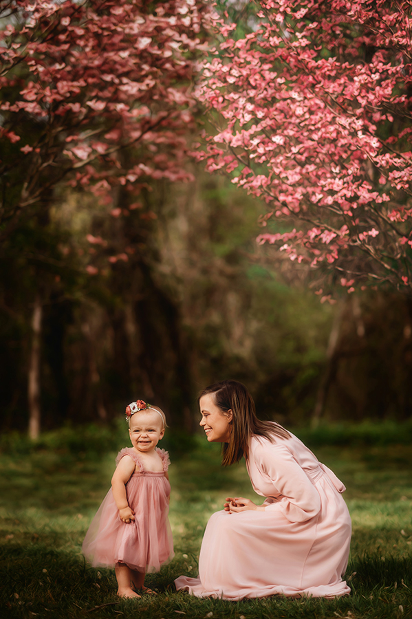 Mother poses with her children for Photos during a Family Photoshoot in Asheville, NC.