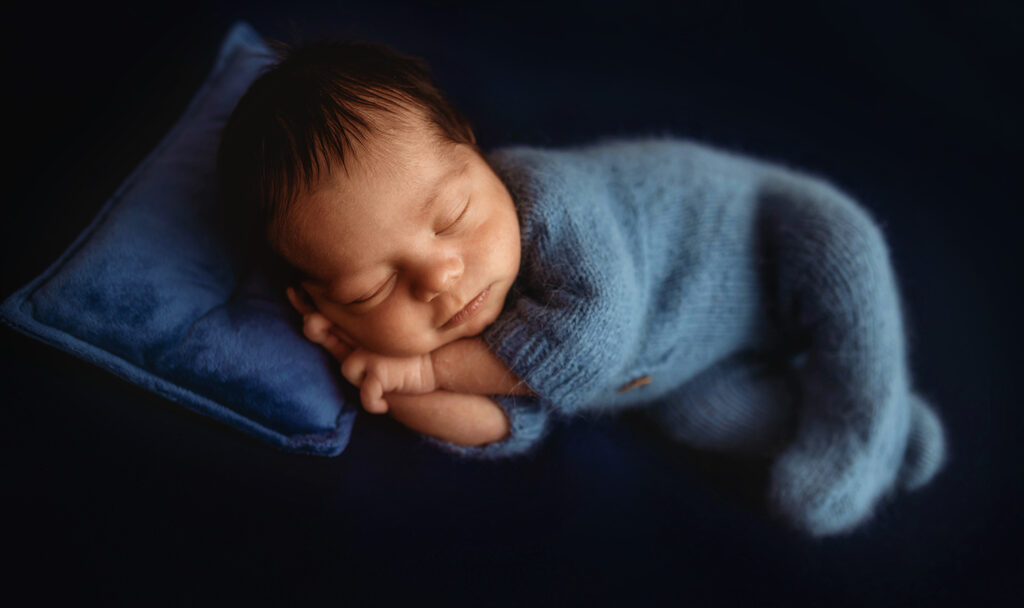 Newborn Baby posed for Newborn Portraits in Asheville, NC.