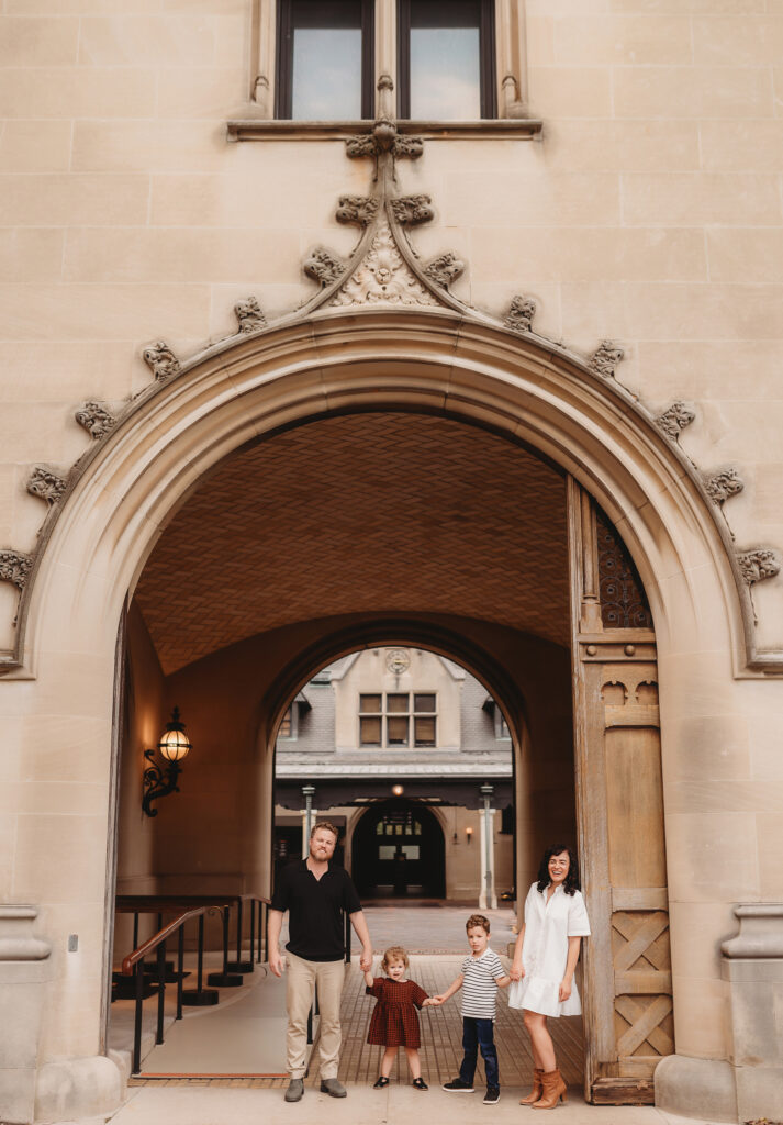 Family poses together during Family Photoshoot at Biltmore Estate in Asheville, NC.