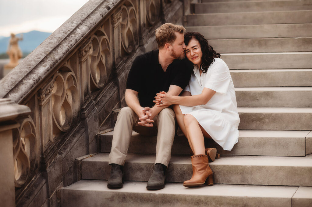 Couple embraces each other during their Family Portraits at Biltmore Estate.