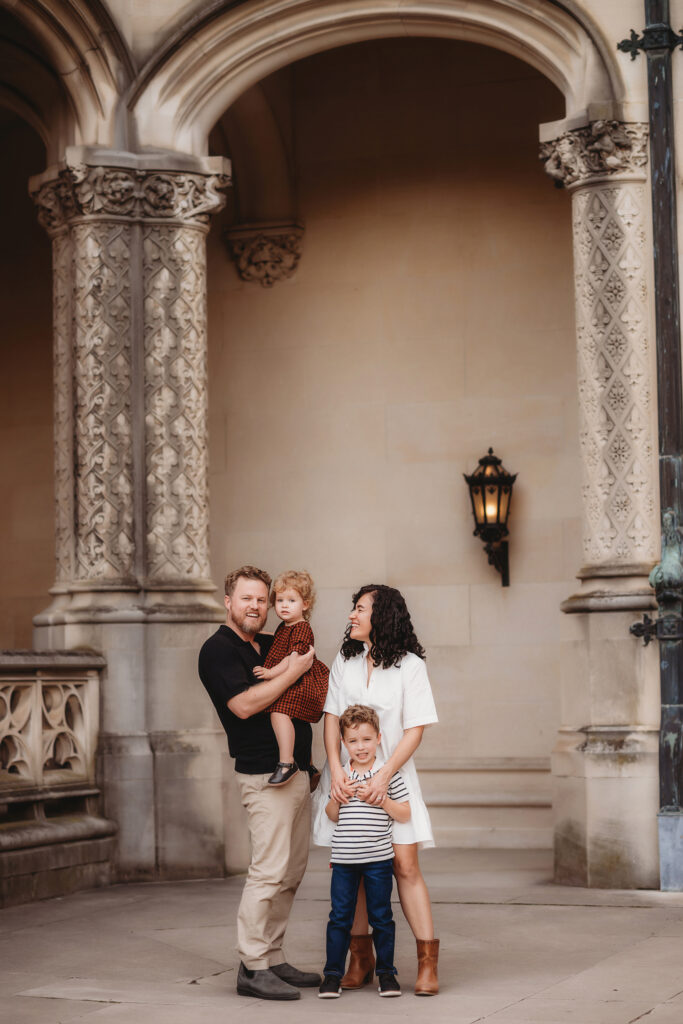 Family poses together during Fall Family Pictures at Biltmore Estate in Asheville, NC.