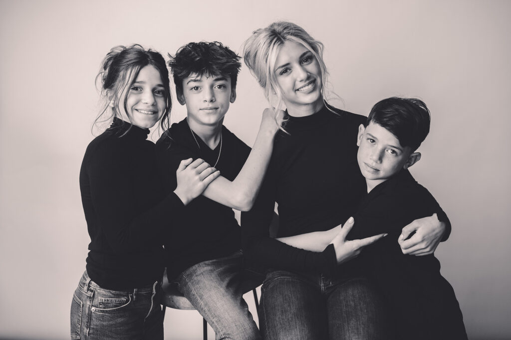 Siblings embrace during Personality Portrait Session in Asheville, NC.