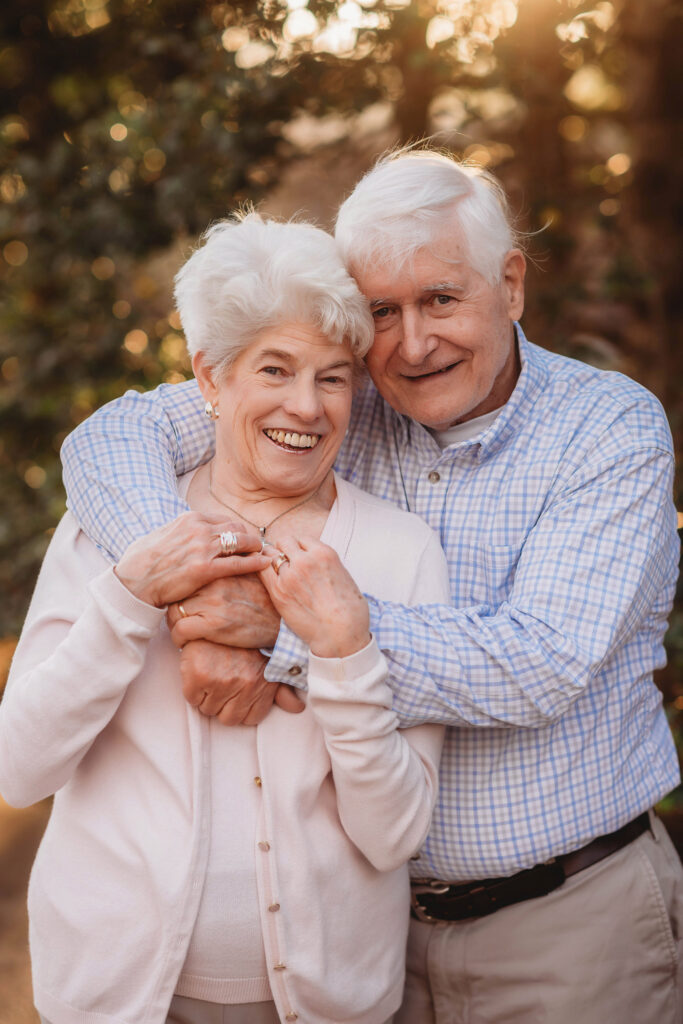 Grandparents pose during Extended Family Portraits at the North Carolina Arboretum in Asheville