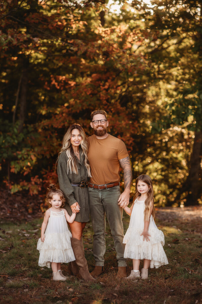 Family poses for during Family Pictures on the Blue Ridge Parkway in Asheville, North Carolina.
