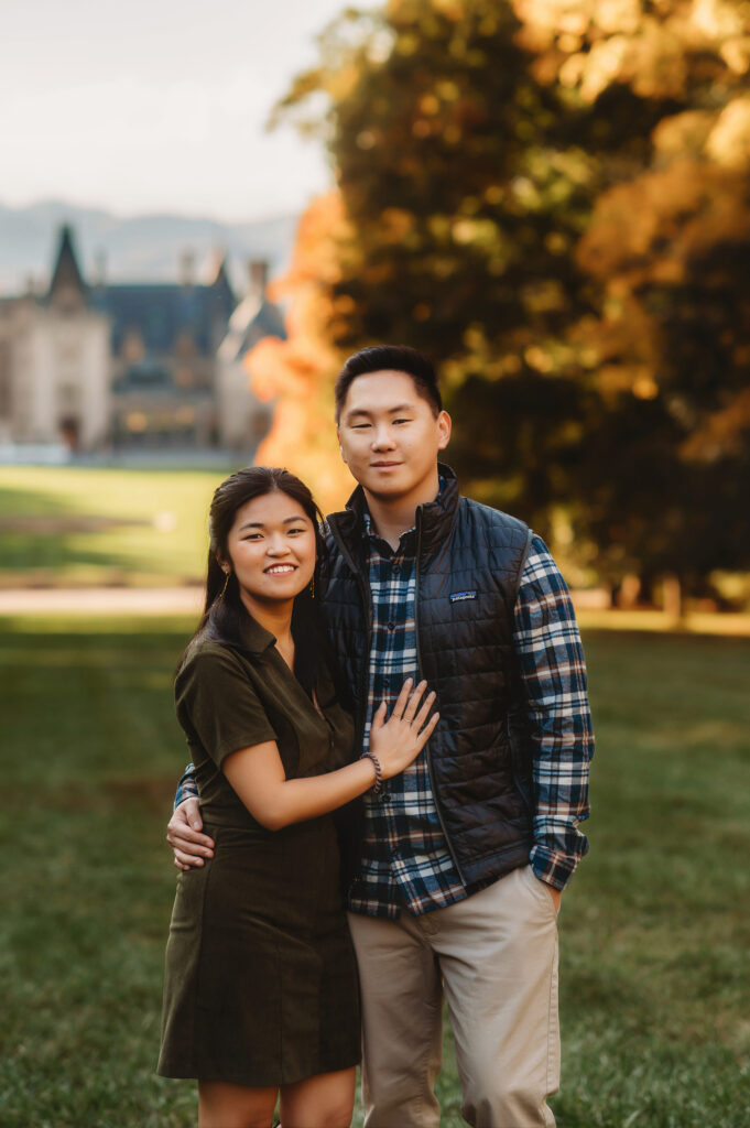 Couple poses for Family Portraits at Biltmore Estate during their visit to Asheville, NC. 