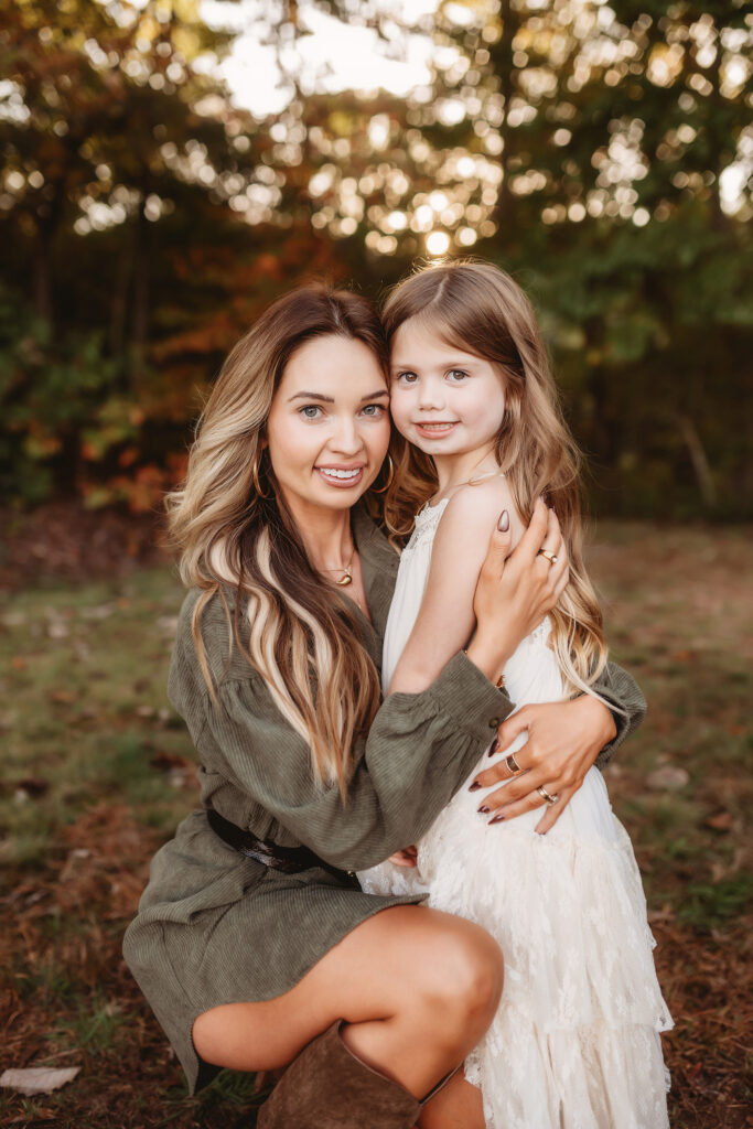 Mother embraces her daughter during Family Portrait Session in Asheville.