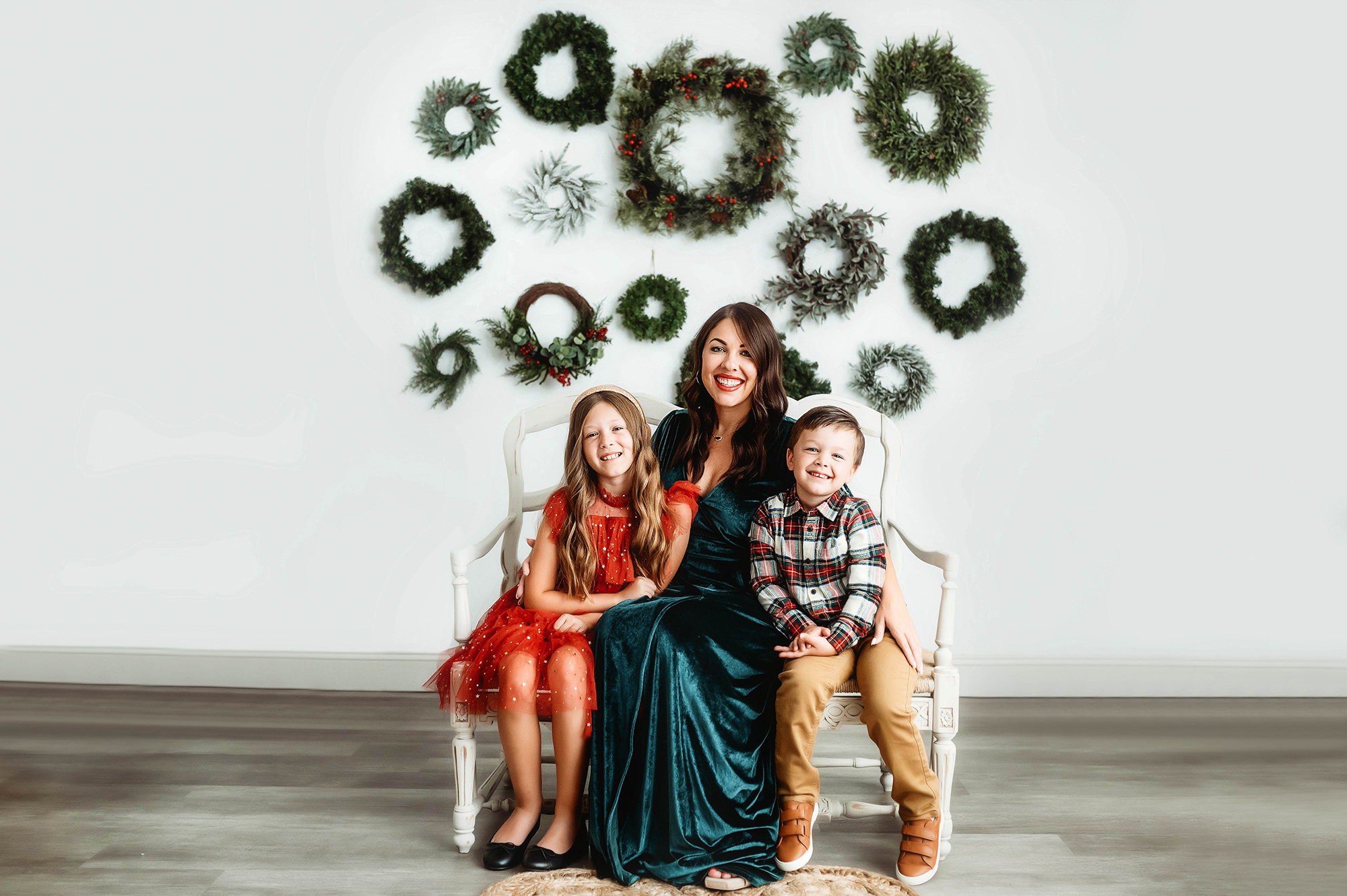 Mother poses with her children for Holiday Mini Session Photos in Asheville, NC.