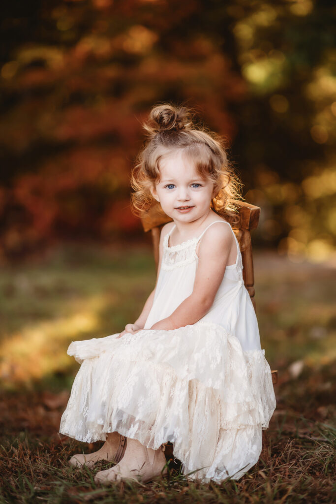 Little girls poses for Family Photos in Asheville.