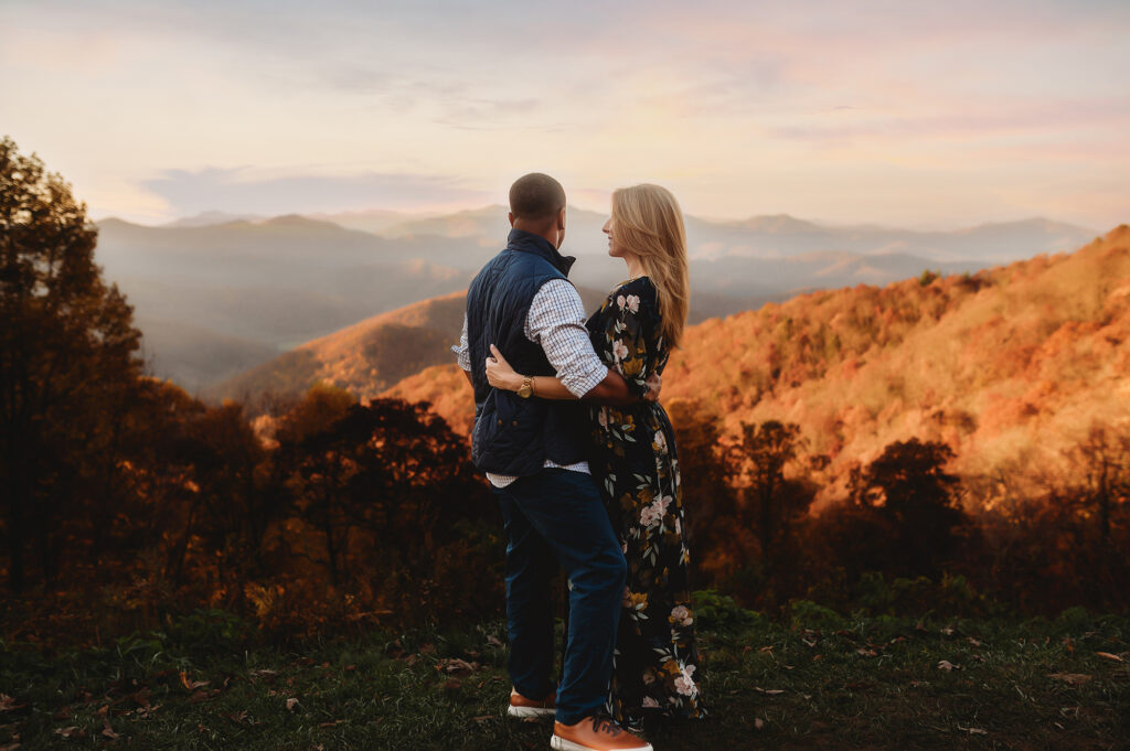 Couple poses for Family Photos on the BRPW in Asheville, NC.