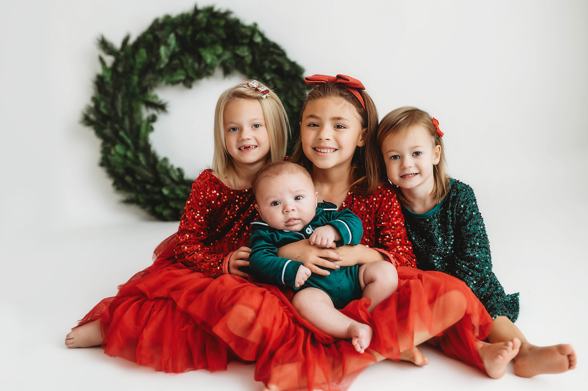 Children pose for Holiday Portraits at Asheville, NC Photo Studio.