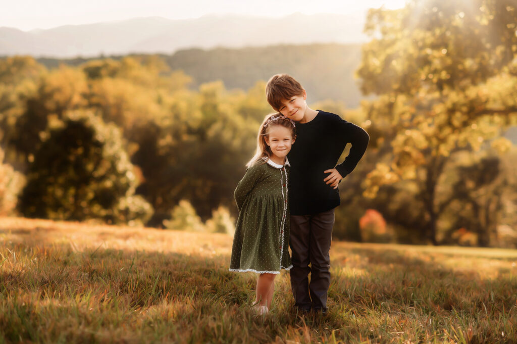 Siblings embrace during Family Photoshoot at Biltmore Estate in Asheville, NC.
