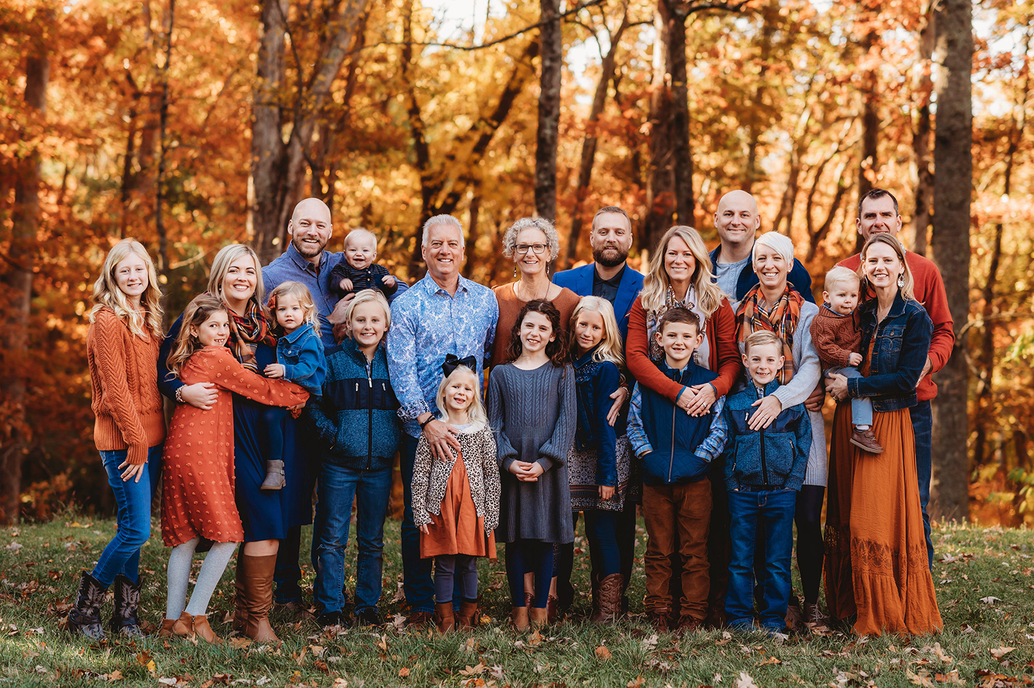 Extended Family poses together for Fall Family Portraits at Biltmore Estate.