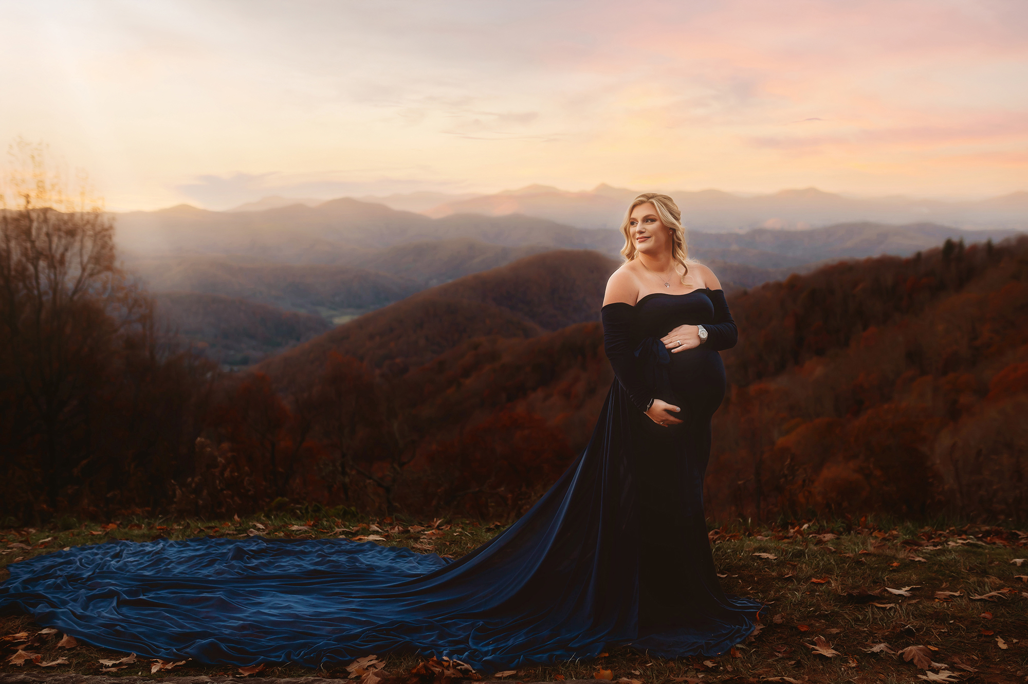 Expectant parents walk along the Blue Ridge Parkway for their Maternity Photoshoot in Asheville, NC.