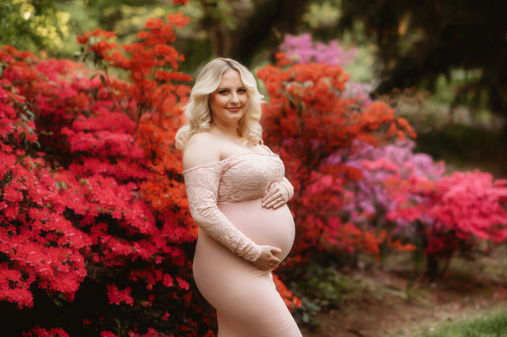 Expectant mother poses for Maternity Portraits at Biltmore Estate in Asheville, NC after learning about the Best Birthing Center in Asheville. 