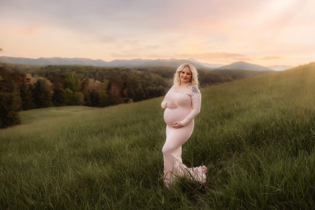 Pregnant woman poses for Maternity Portraits at Biltmore Estate in Asheville, NC.