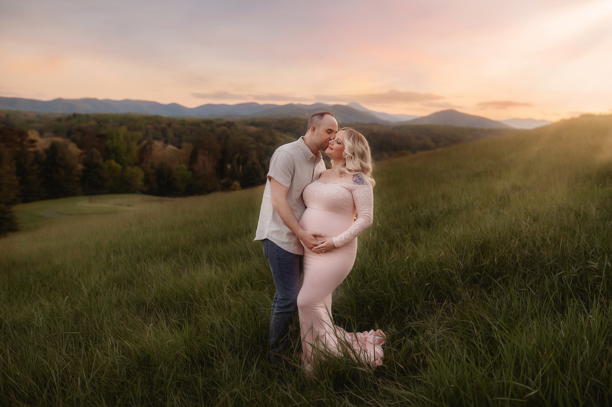 Expectant Parents pose for Maternity Photos at Biltmore Estate in Asheville, NC.