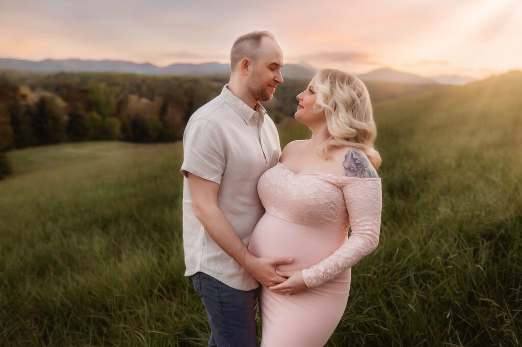 Expectant parents pose for Maternity Portraits at Biltmore Estate in Asheville, NC after learning about the Best Birthing Center in Asheville. 
