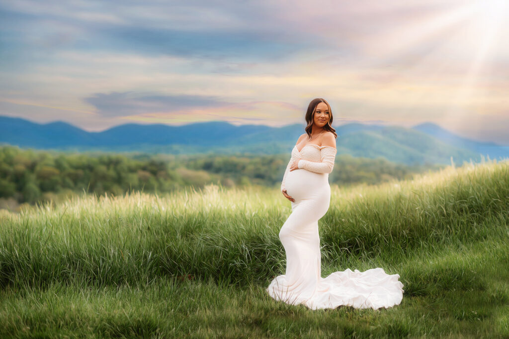 Pregnant woman poses for Maternity Photos in Asheville NC.