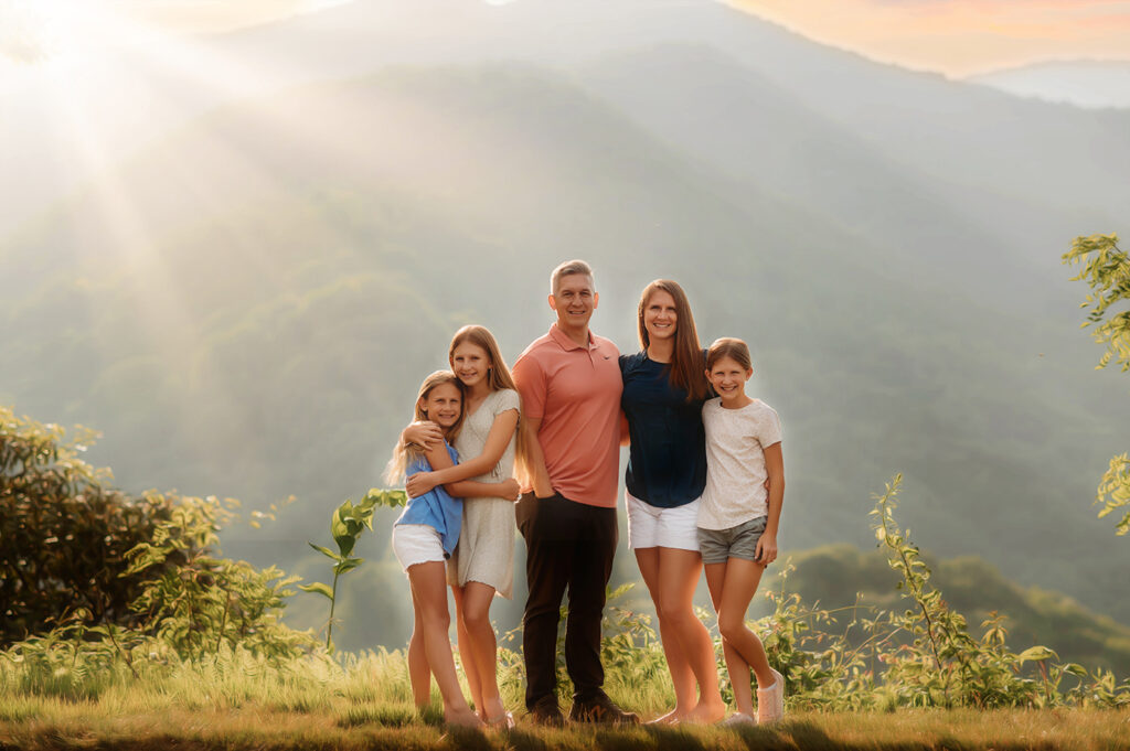 Family poses for portraits during their Family Reunion Photoshoot in Asheville, NC.