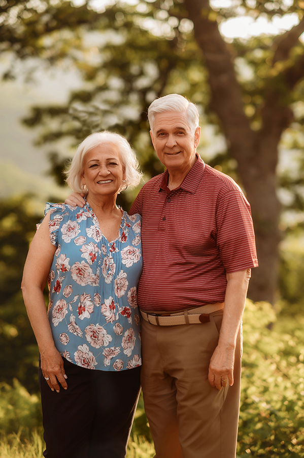 Elderly Couple poses for portraits during their Family Reunion Photoshoot in Asheville, NC. 
