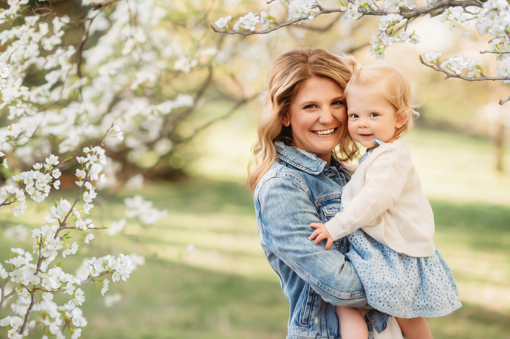 Mom embraces her baby during a Spring Photoshoot in Ashville, NC.