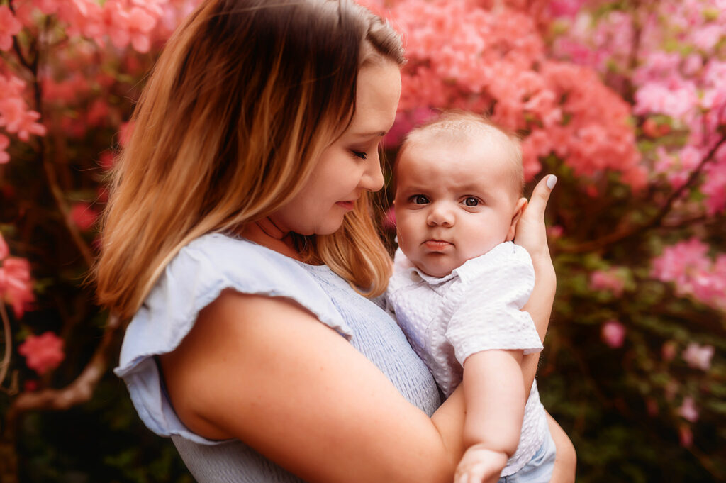 Mother poses with her baby for a Spring Photoshoot at Biltmore Estate in Asheville, NC.