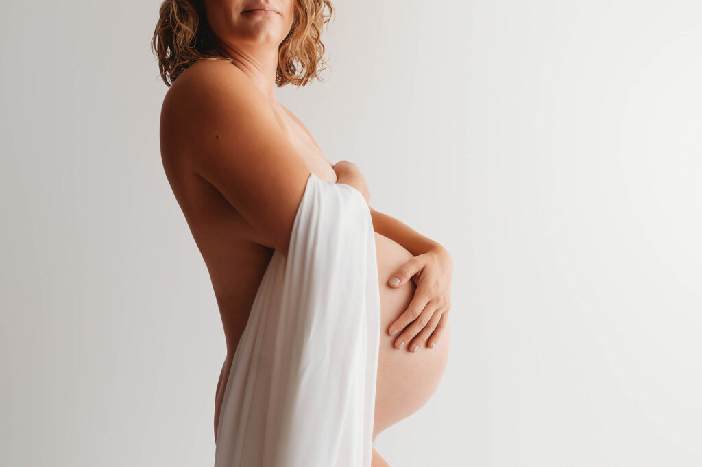 Pregnant mother poses for Maternity Photoshoot in Asheville. 