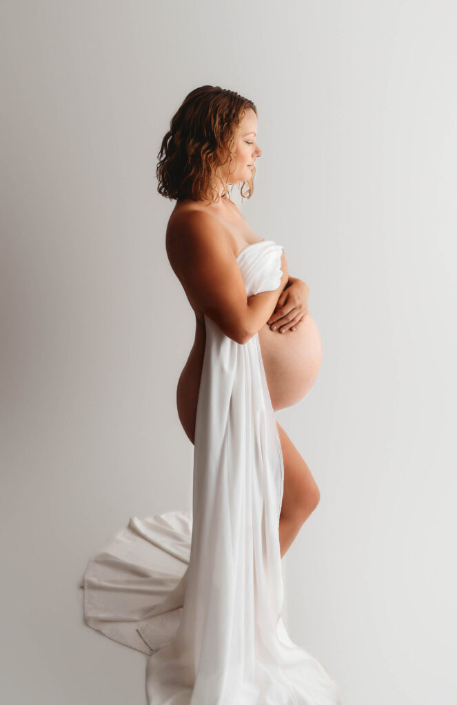 Expectant mother poses for Maternity Portraits in Asheville, NC Maternity Photo Studio. 