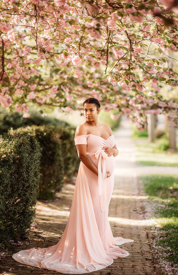 Expectant Mother poses for Maternity Portraits in the Spring in Asheville, NC.
