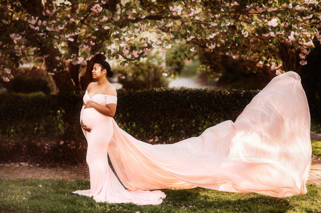 Expectant Mother poses for Maternity Portraits in the Spring in Asheville, NC.
