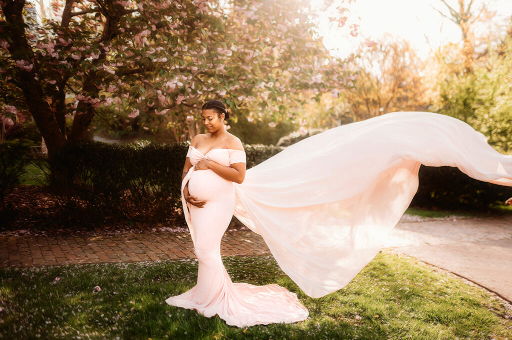Expectant Mother poses for Maternity Portraits in the Spring in Asheville, NC.