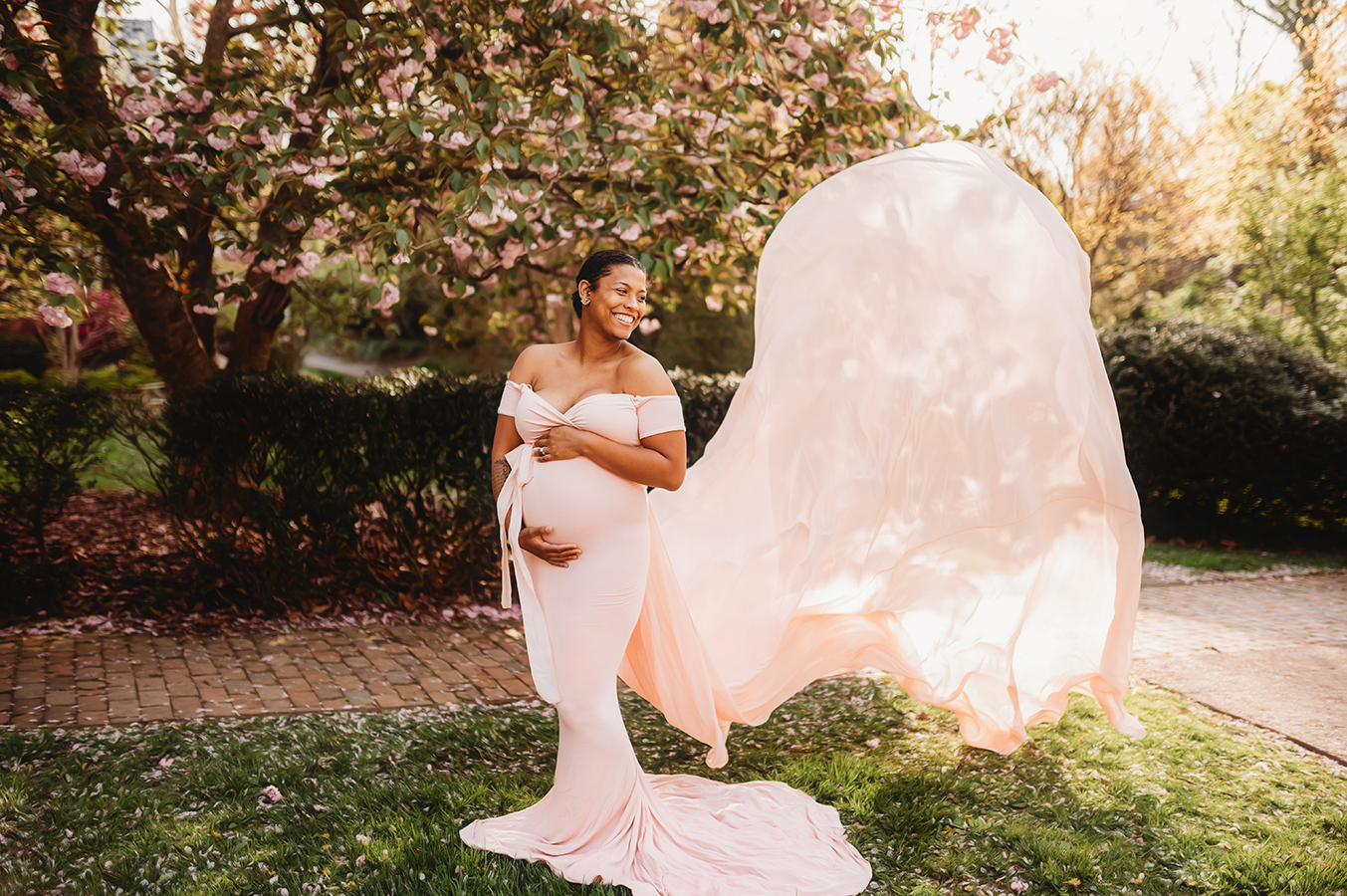 Expectant Mother poses for Maternity Portraits in the Spring in Asheville, NC.