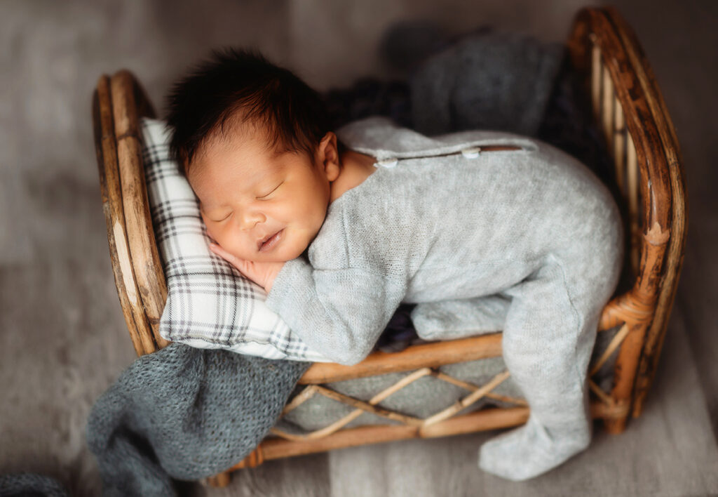 Newborn Baby posed for Newborn Portrait Session at Asheville, NC Newborn Photography Studio.