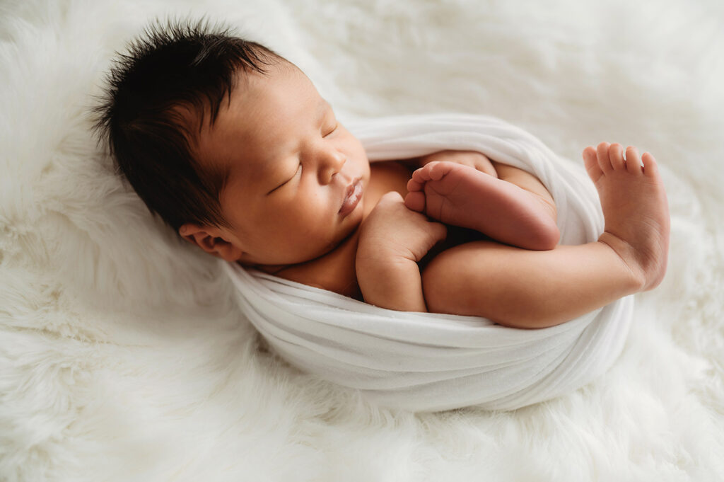 Newborn Baby posed his for Newborn Portrait Session at Asheville, NC Newborn Photography Studio.