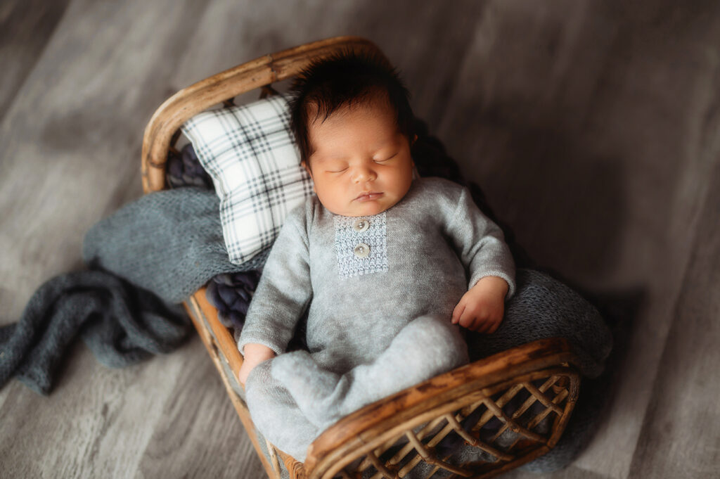 Newborn Baby posed for Newborn Portrait Session at Asheville, NC Newborn Photography Studio.
