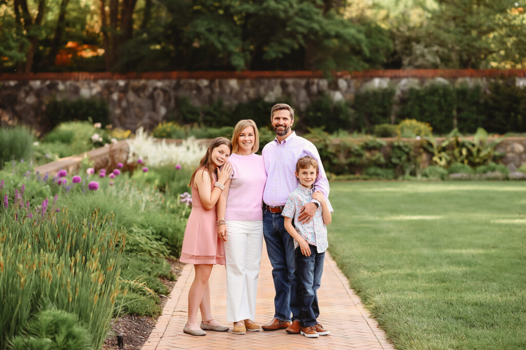 Family poses together for Family Portraits at Biltmore Estate while Visiting Asheville with Kids!