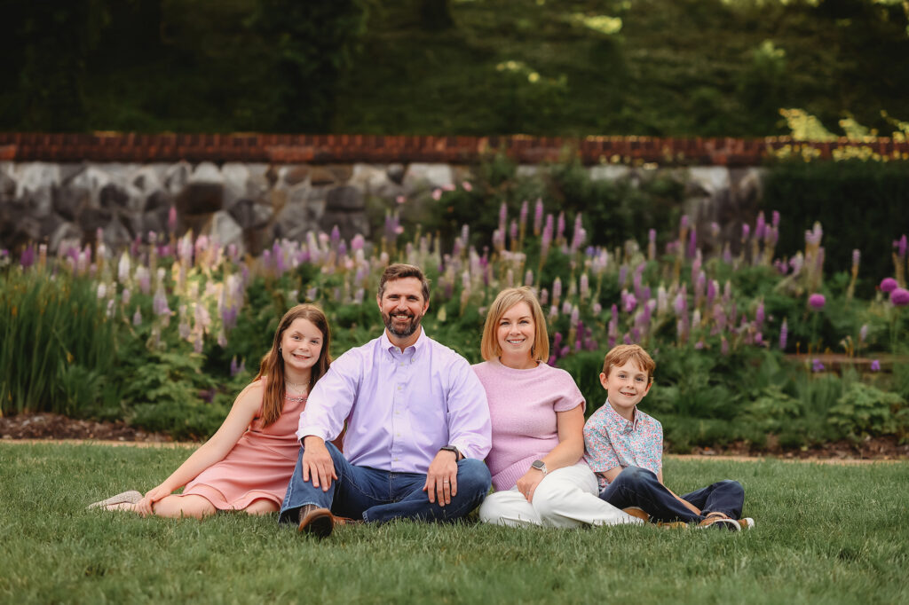 Family poses together for Family Portraits at Biltmore Estate while Visiting Asheville with Kids!