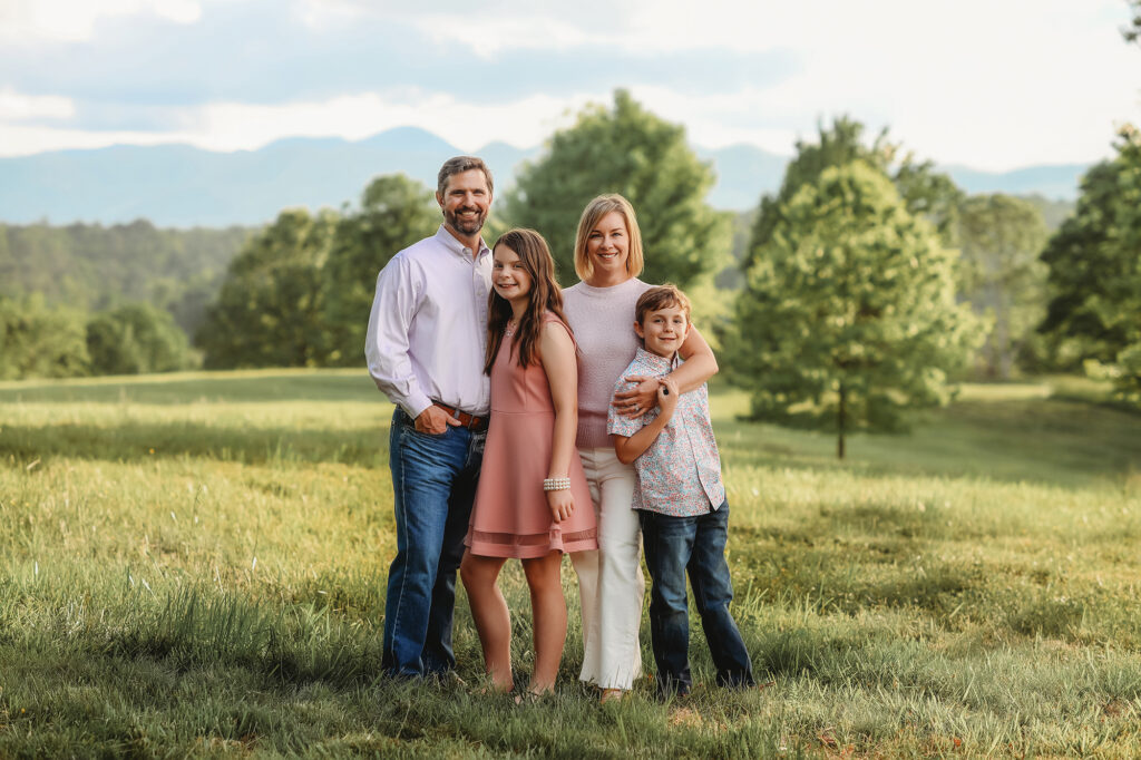 Family poses together for Family Portraits at Biltmore Estate while Visiting Asheville with Kids!