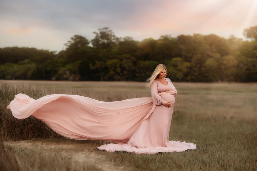 Pregnant mother poses for Maternity Portraits in Asheville, NC after receiving fertility treatment from the Best Fertility Specialists in Asheville. 