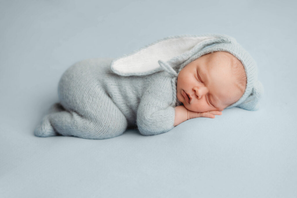 Asheville Newborn Photography Studio provides the Best Newborn Photos in Asheville. Portrait of a Newborn Baby boy posed for his Infant Photoshoot in Asheville.