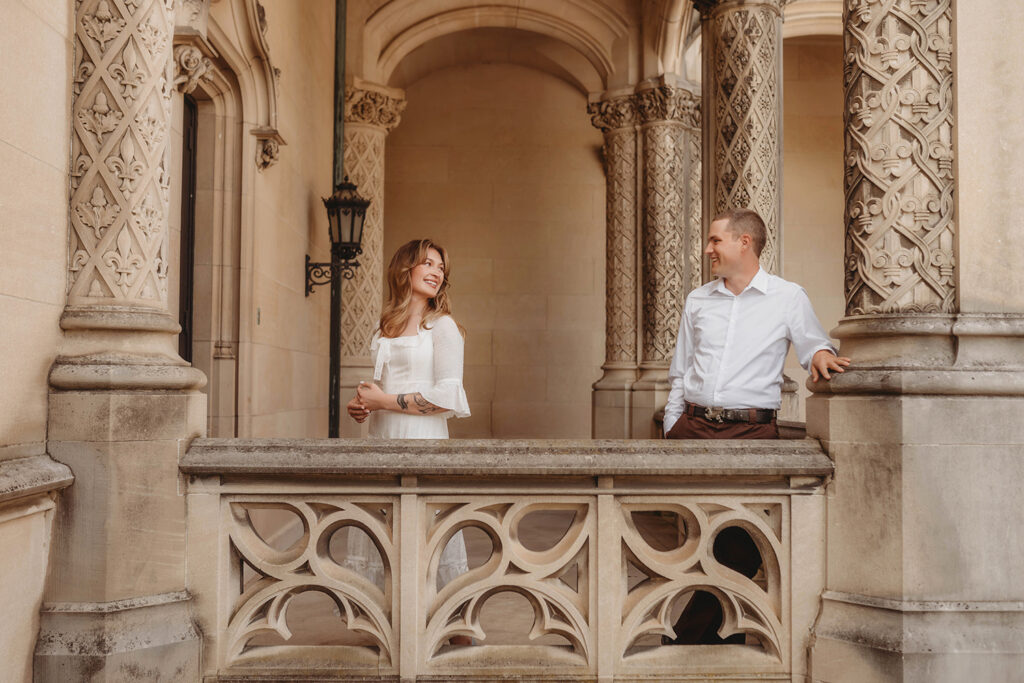 Newly Engaged Couple poses for Biltmore Estate Engagement Photos with Asheville Portrait Company in Asheville, NC