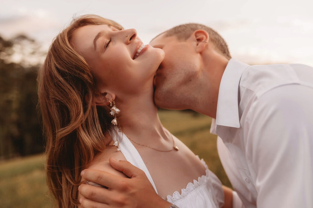 Newly Engaged Couple poses for Biltmore Estate Engagement Photos with Asheville Portrait Company in Asheville, NC