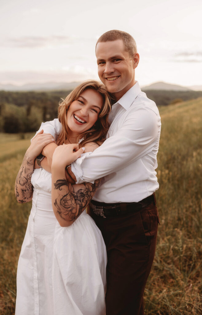 Newly Engaged Couple poses for Biltmore Estate Engagement Photos with Asheville Portrait Company in Asheville, NC