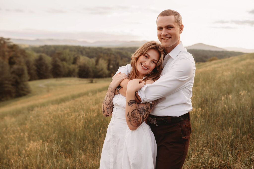 Newly Engaged Couple poses for Biltmore Estate Engagement Photos with Asheville Portrait Company in Asheville, NC
