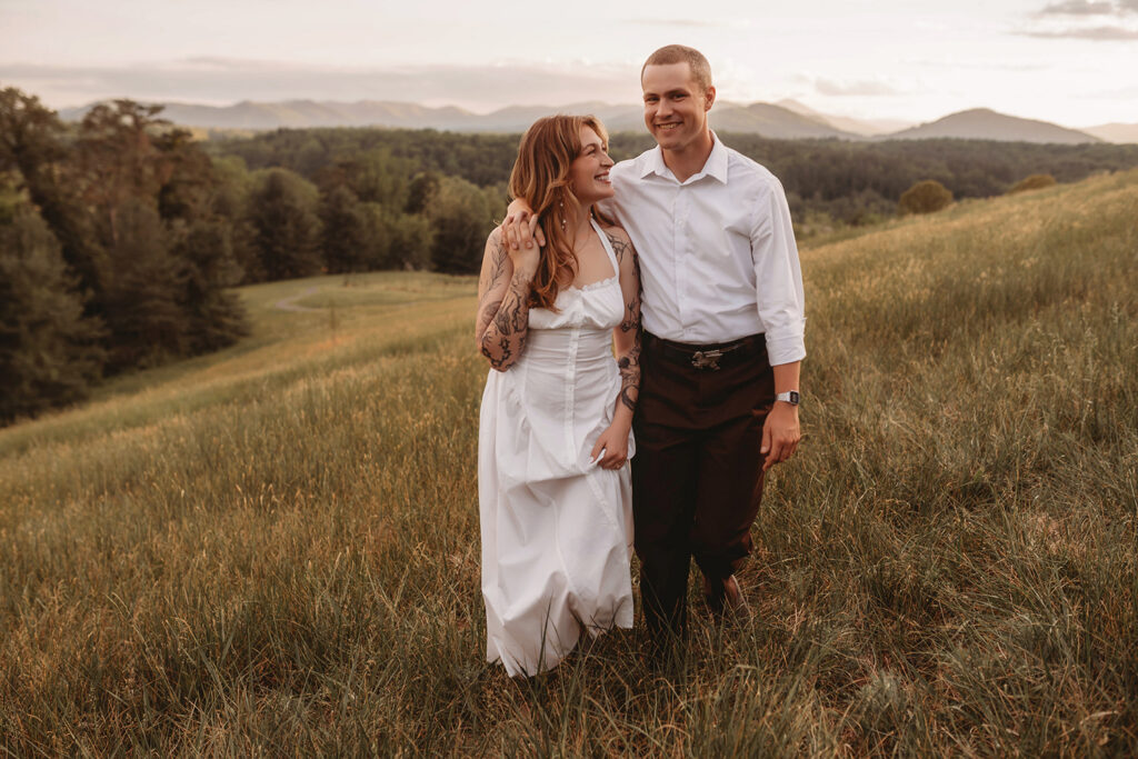 Newly Engaged Couple poses for Biltmore Estate Engagement Photos with Asheville Portrait Company in Asheville, NC