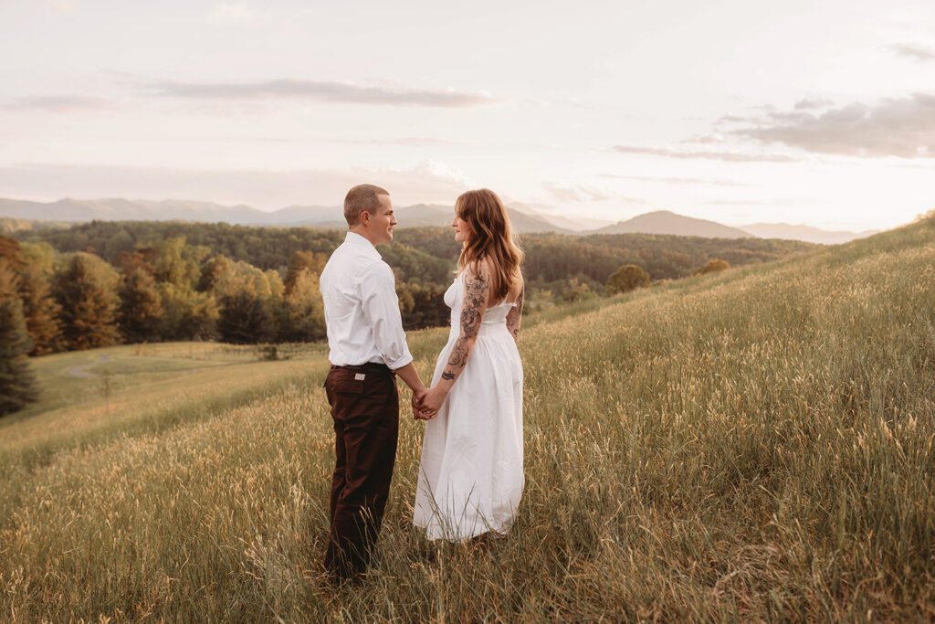 Newly Engaged Couple poses for Biltmore Estate Engagement Photos with Asheville Portrait Company in Asheville, NC